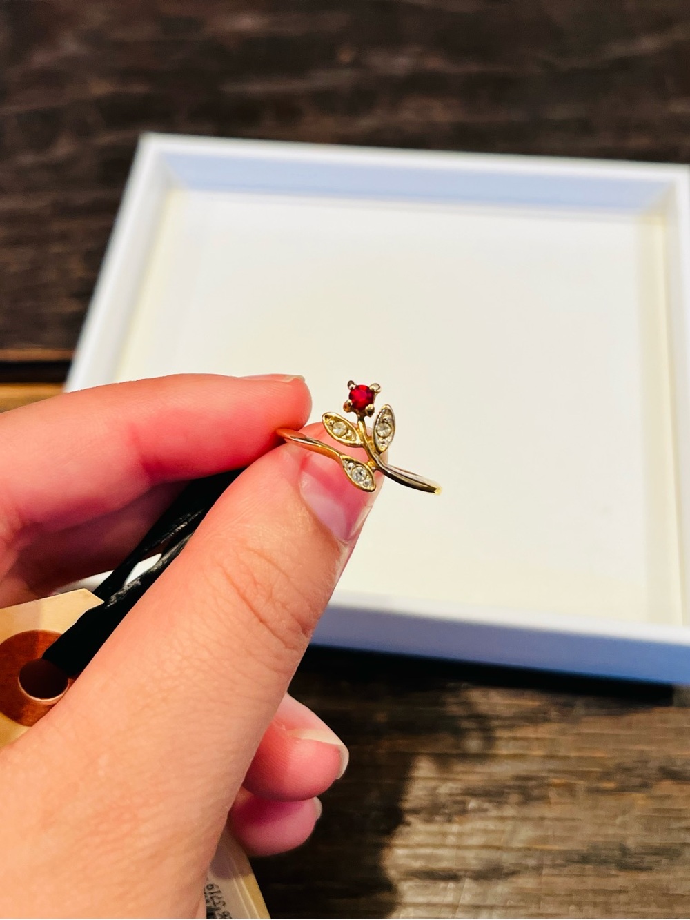 Gold Floral Ring with Red Gemstone